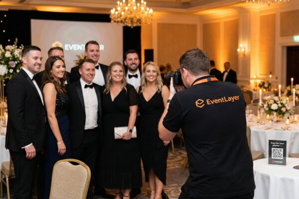 EventLayer photographer capturing a group photo at a corporate awards evening
