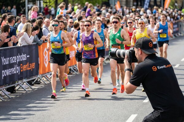 EventLayer photographer capturing marathon runners at a race event